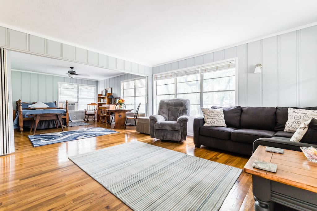 Living area open to second bedroom with divider which can be closed.