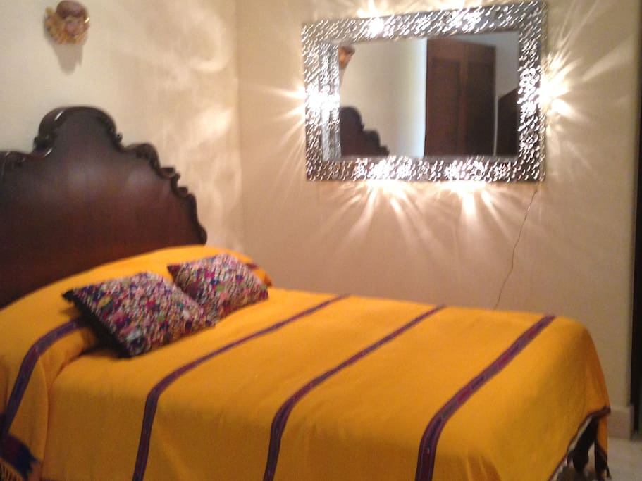 This bedroom includes a queen bed, sat tv and ensuite.