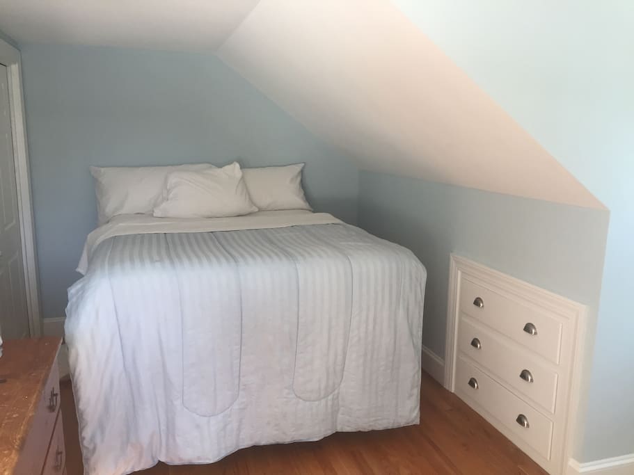Bedroom with drawers and closet