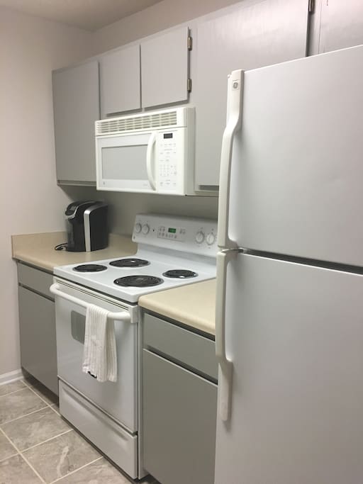 Keurig, Microwave, Diswasher, well-stocked kitchen