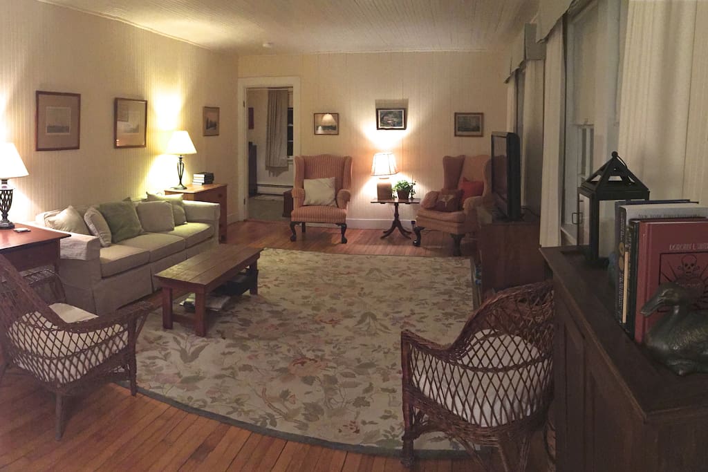 Large, sunny shared living room with cable tv.