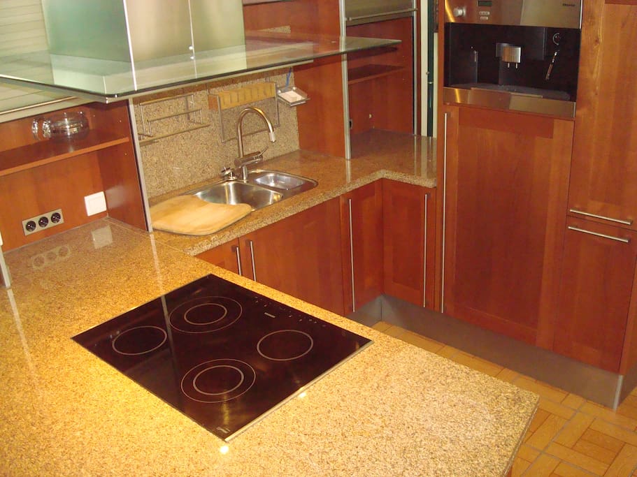 Cooktop kitchen and coffee machine
