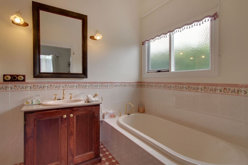 Large ensuite with separate bath and shower