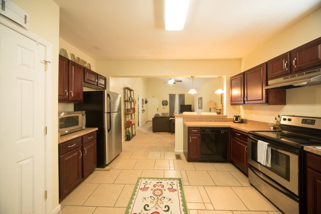 Looking through the spacious kitchen into the living room.