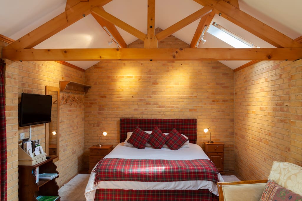 Super king bed, TV on wall. Clothes hooks and hangers available