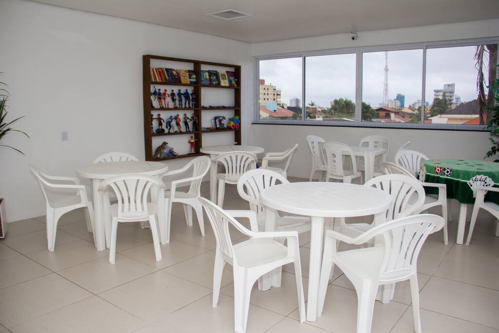 Biblioteca e brinquedoteca no terraço