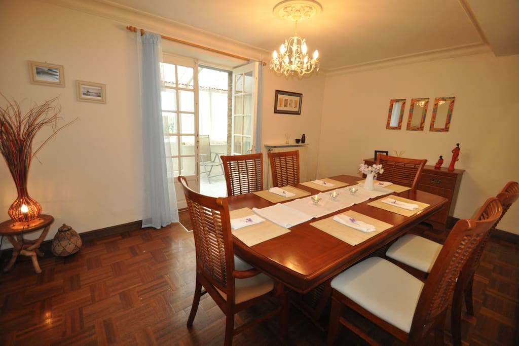 Dining Room with Double Doors through to Garden Room