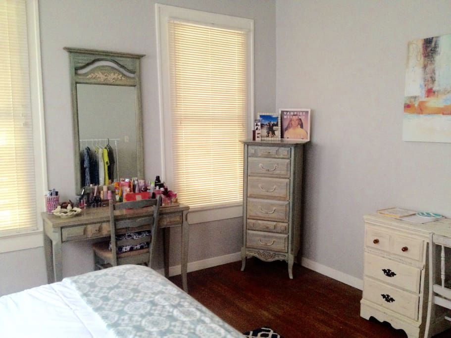Natural lighting, vanity, and storage space