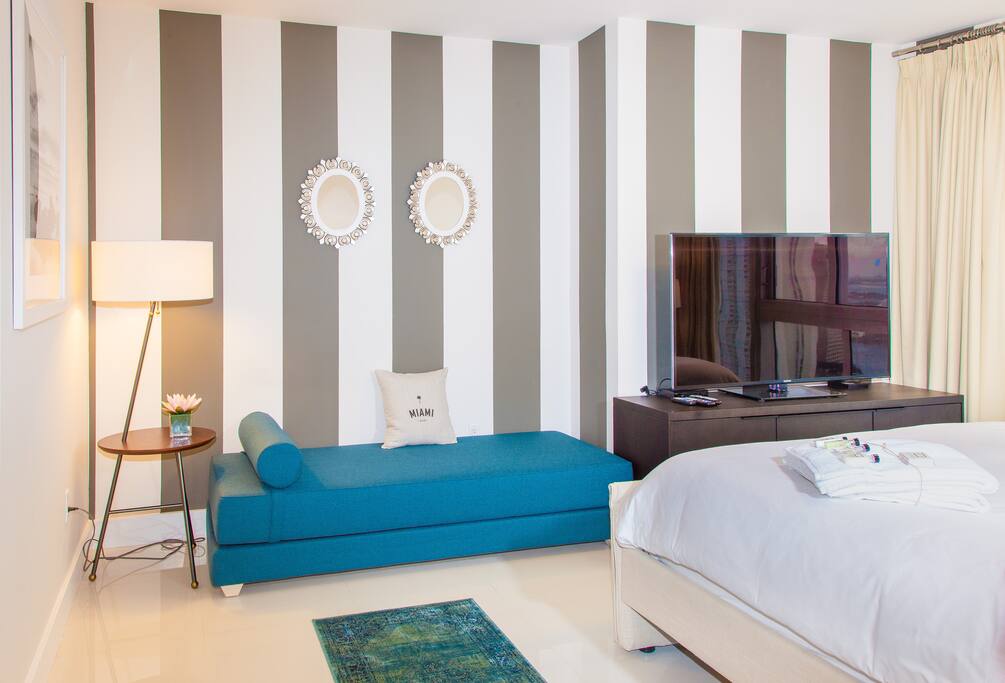 Classy property. Master bedroom with day bed.