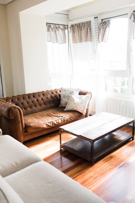 The living room area is so bright and airy.