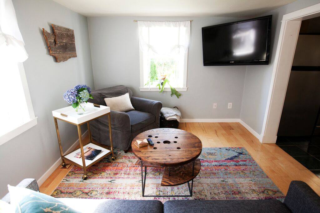 Another window giving the room more natural light. Flat screen TV with ROKU channels available.