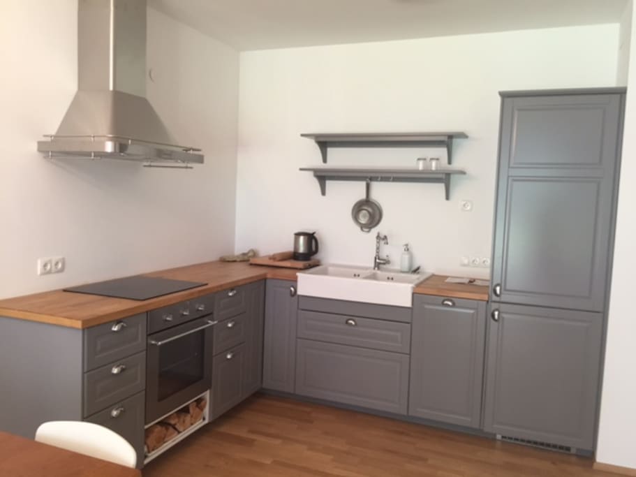 Country-house style kitchen including all amenities you need (dishwasher, fridge, freezer, plates, cutlery, pots, water kettle)