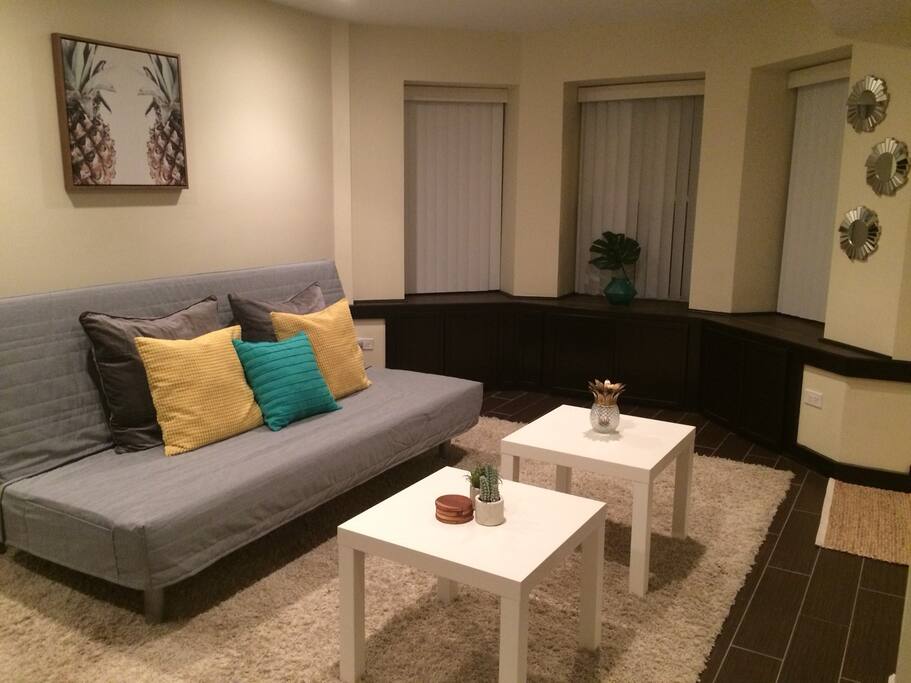 Queen size futon in the living area.