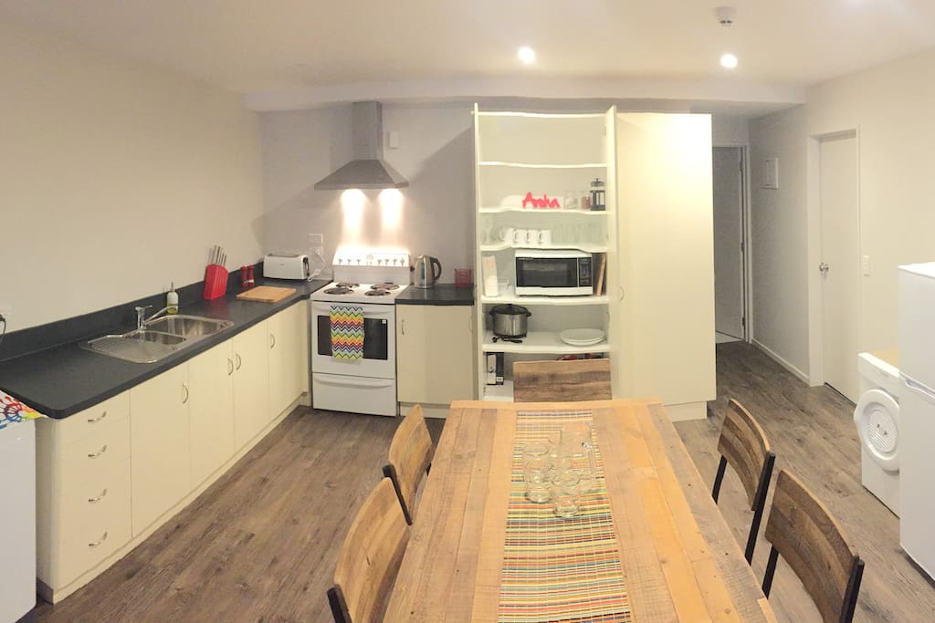 Fully equipped kitchen and dining table seats 6