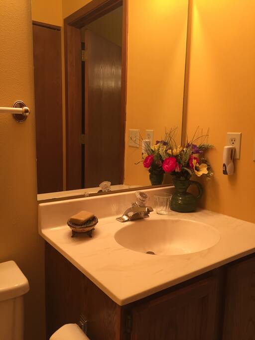Half bathroom and Laundry off of kitchen.