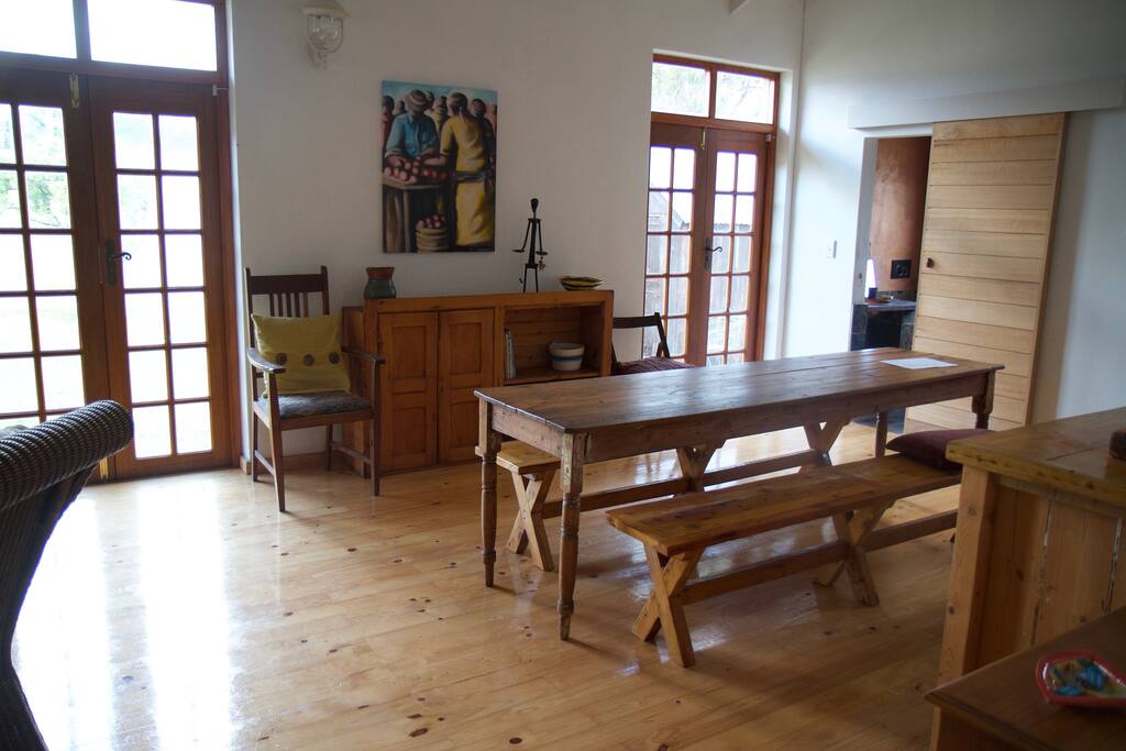 Family room dining area showing door to shower room
