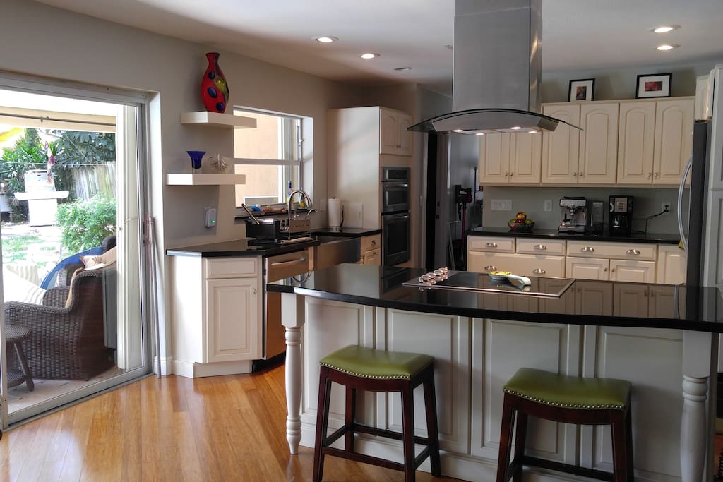 Great Chef's Kitchen is open to the living area and overlooks the pool area.