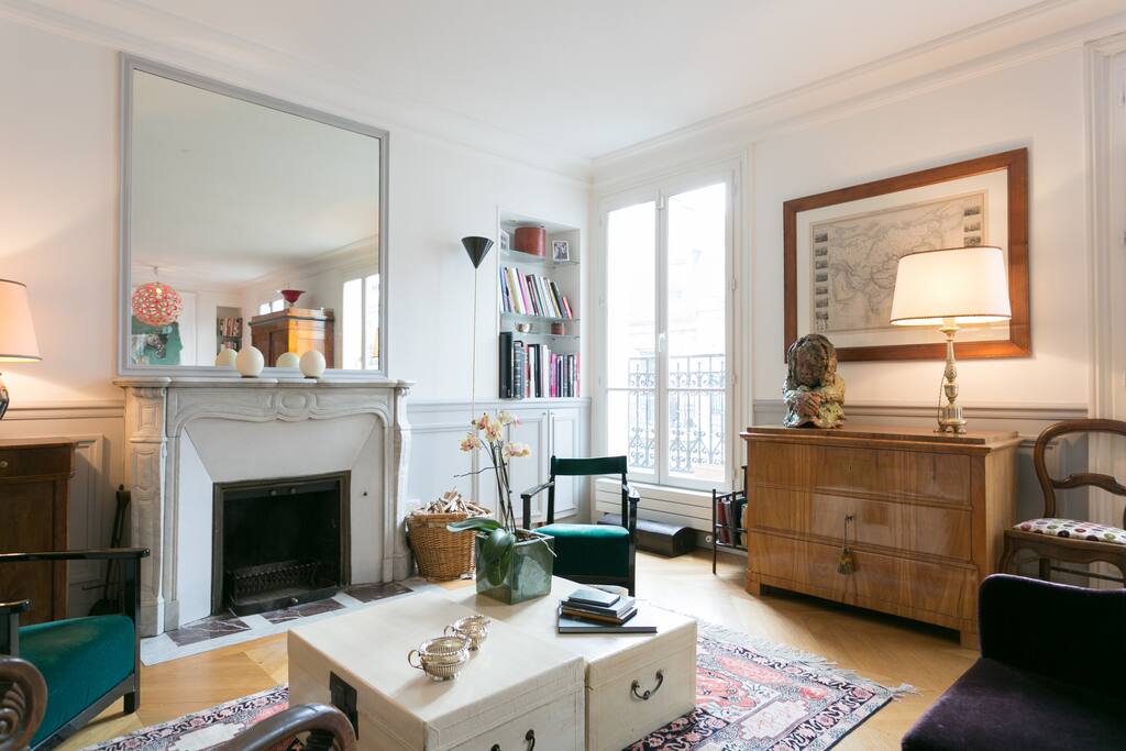 Living room with two large sofa and French antic decoration