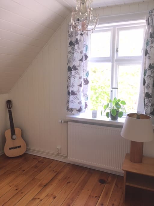 The room is bright and cozy