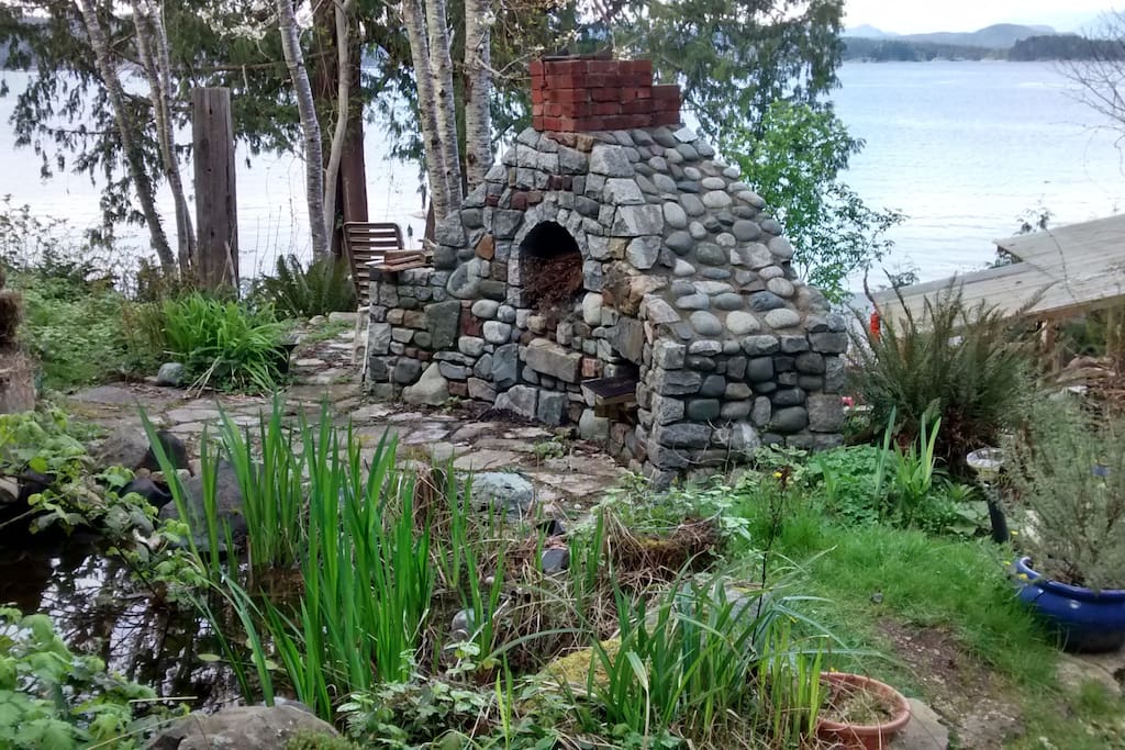 outdoor kitchen with pond