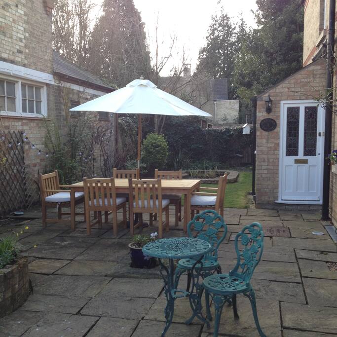 new outdoor dining table (pond has safety grate)
