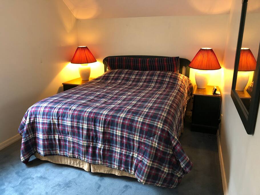Bedroom with a comfortable queen size bed