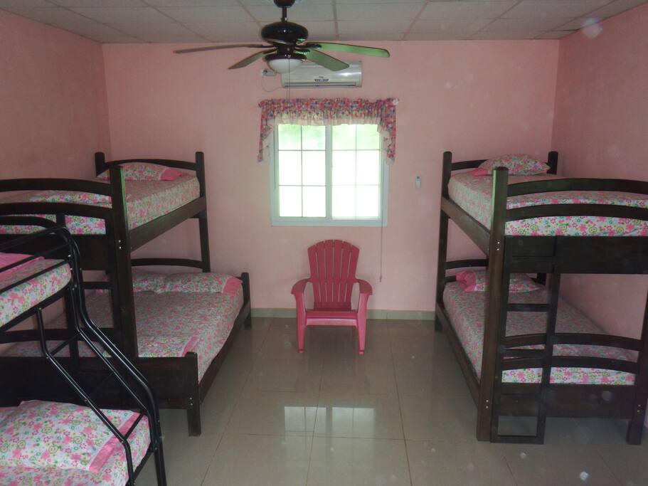 Nice clean and comfortable room with 6 beds. 2 full and 4 twin semi-orthopedics size matresess. In 3 bunkbeds. It has a private equiped kitchen and bathroom with hot showers. A/C, ceiling fan. Cost: 2 people $49.50; 3 to 4 people $66.00; additional person: $11.00 ea