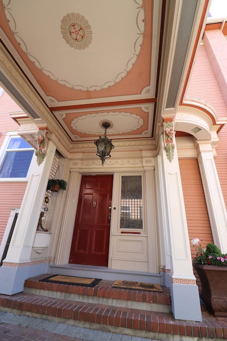 The front entrance has towering Georgian columns.