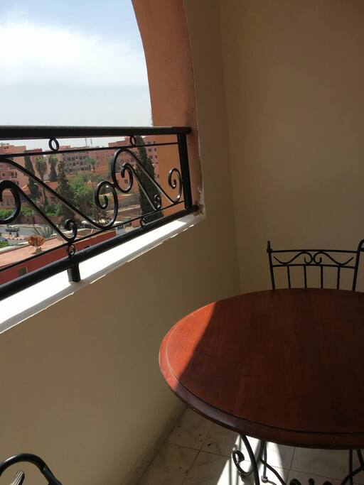 Terrace with table and chairs for your outdoor sitting and eating pleasure.