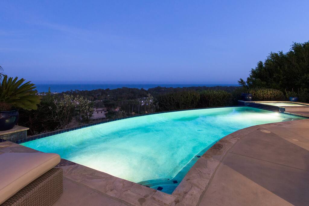 Infinity pool and jacuzzi spa with ocean views.