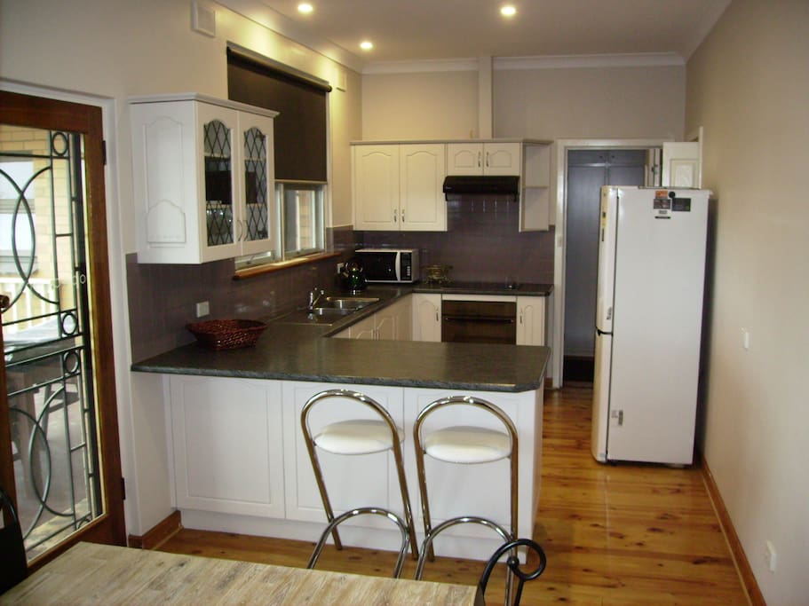 Airy,ample,fully appointed modern kitchen