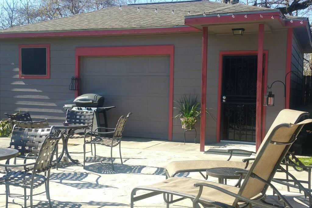 Lighted-patio area with grill.