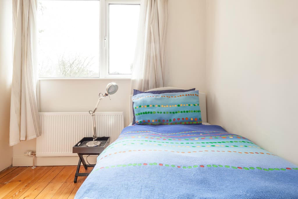 Bedroom 1: Single Bed with storage