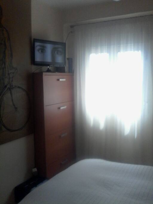 Habitación exterior privada con TV22".