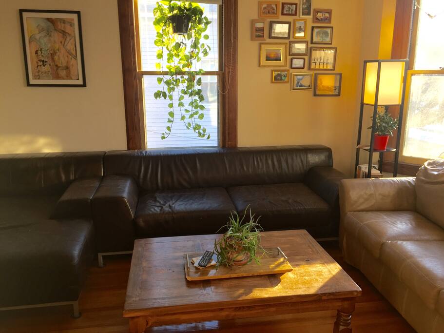 Living room with 2 large couches and a flat screen TV