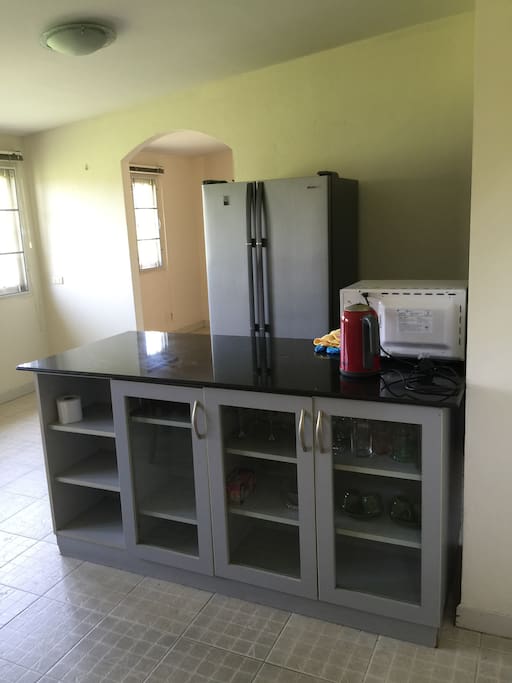 Big kitchen with all fridge, microwave, and more