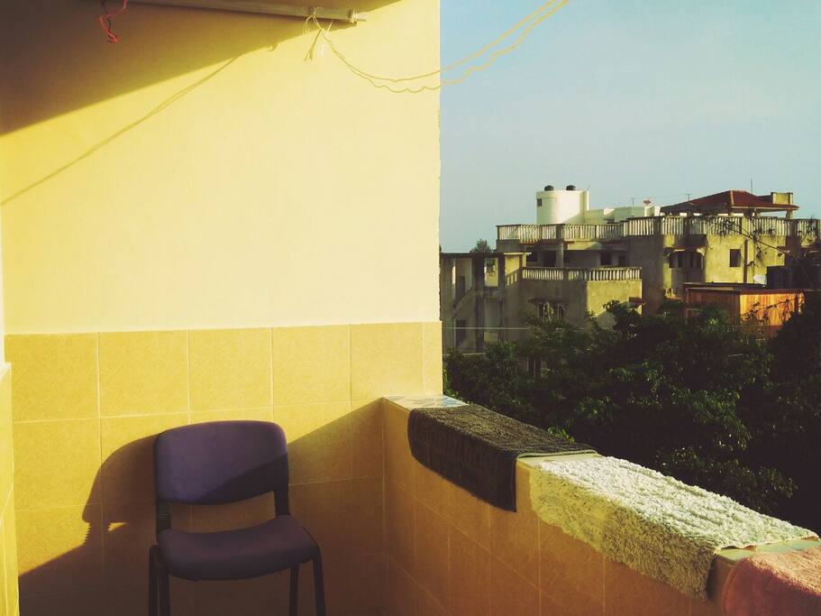 Rear balcony and laundry area