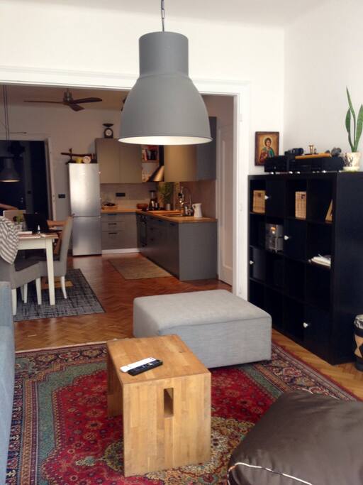 Living room with one big fold-out couch for 3 persons.