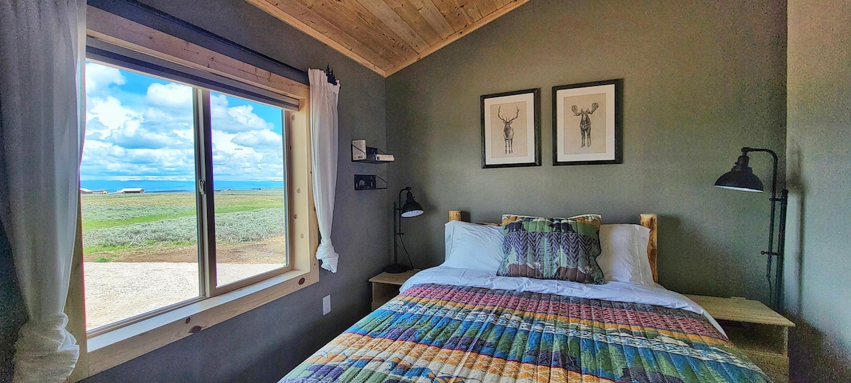 The bedroom on the east side offers views of the Wind River Mountain range.