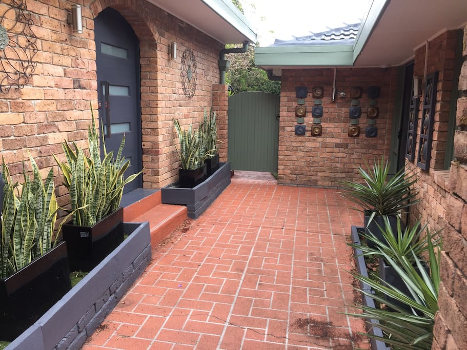Main entrance. Flat on the left and our house on the right.