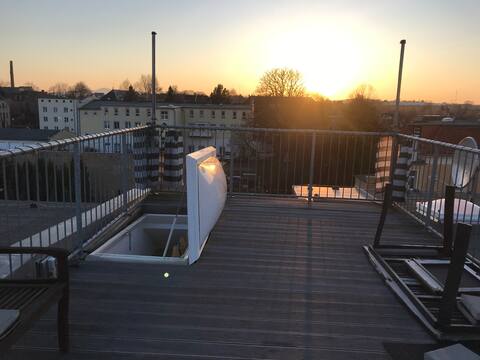 Top floor apartment with rooftop terrace