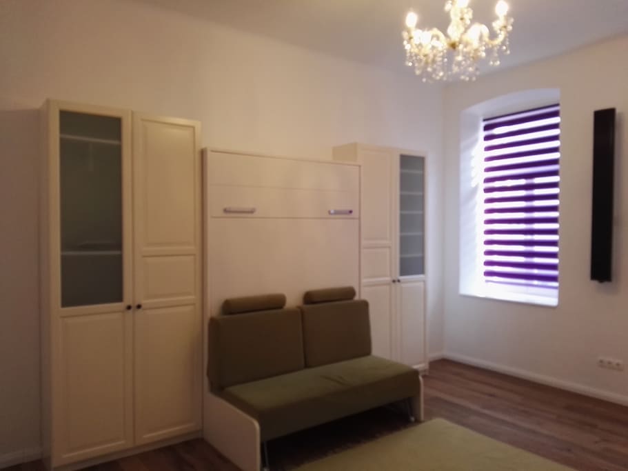 Sofa mit integriertem Wandschrankbett