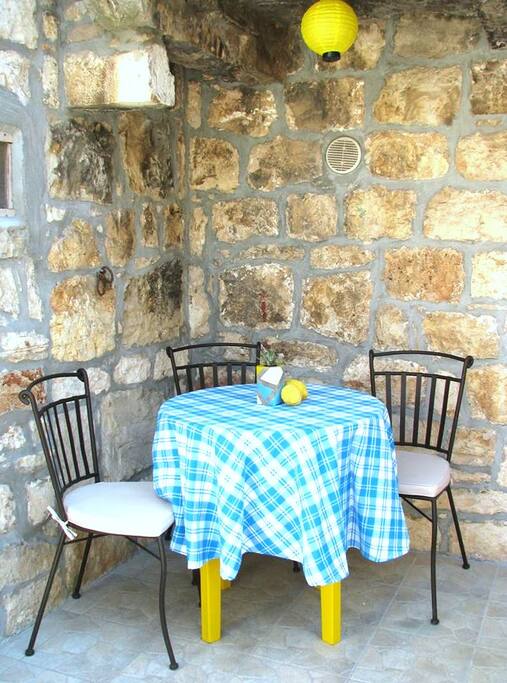 Outside area with table and chairs