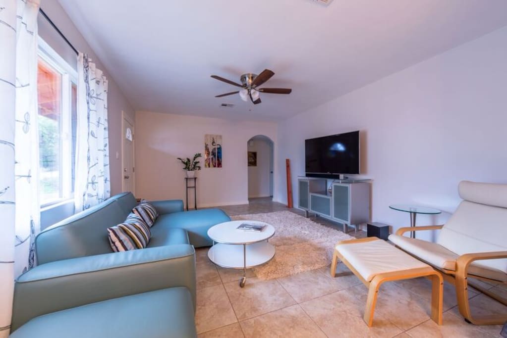 55" Smart TV, comfortable leather furniture, and Blue-Tooth Sound Bar for syncing your own music choices as well as theater effect sound for movie viewing--Like us on that popular website that Mark Zuckerberg brought you (ContactLilySleeps)