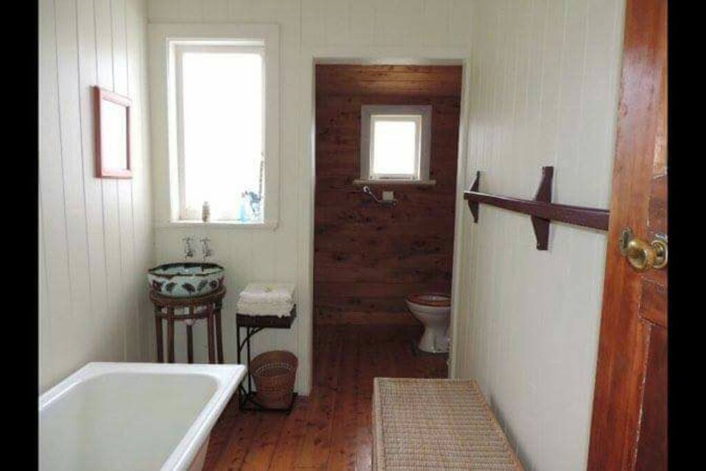 Bathroom there is also a separate shower and an outside toilet