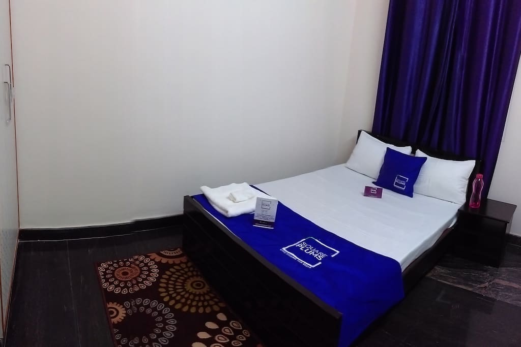 Bedroom 1 with queen size bed and wardrobes