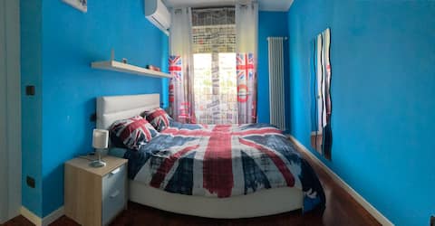 Sunny flat between hill and city