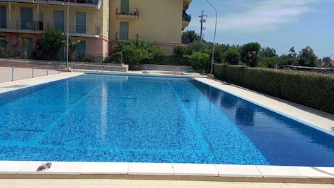 Renovated accommodation with swimming pool and parking space.