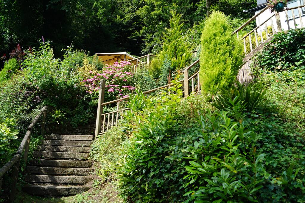 Private path & stone steps up to the property.
