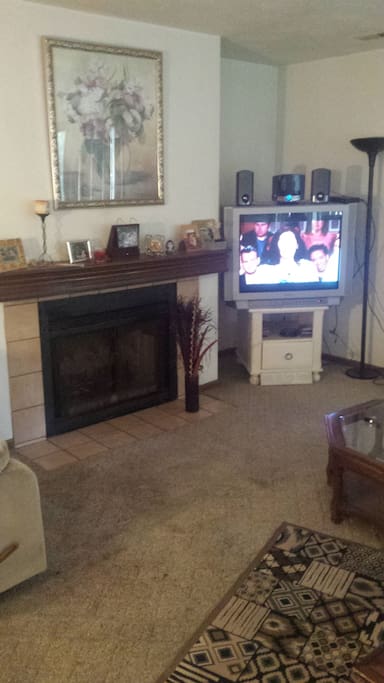 Living room, tv, and fireplace